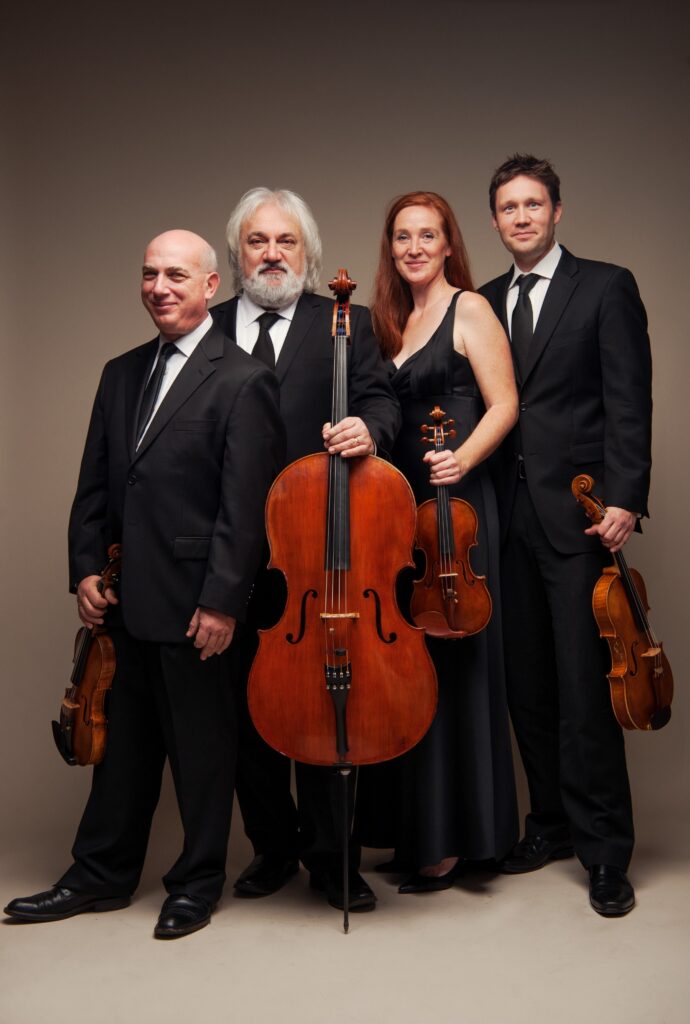 Group photo of the North Hollywood String Quartet, classical musicians in formal attire.